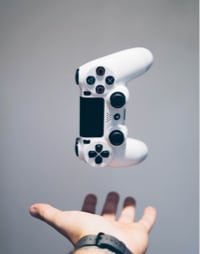 hand with a videogame controller